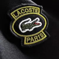 $56.00 USD Lacoste Tracksuits Short Sleeved For Men #1420438